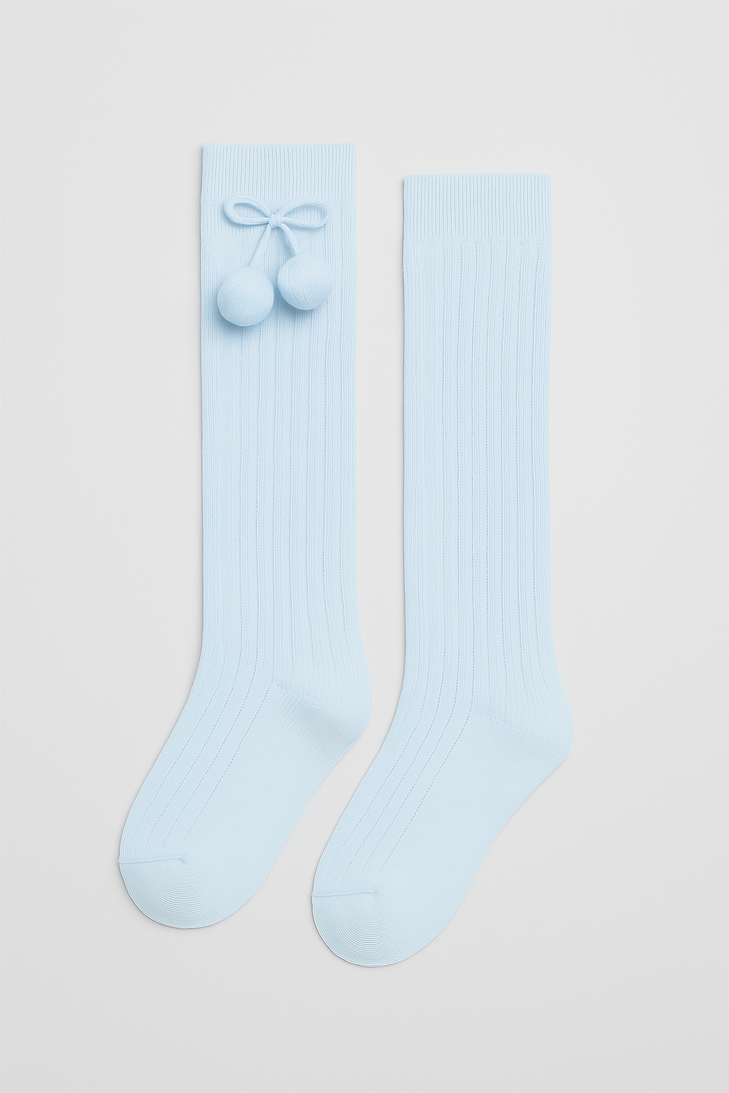 02833-calcetines-largos-pompones-infantil-ysabel-mora-celeste
