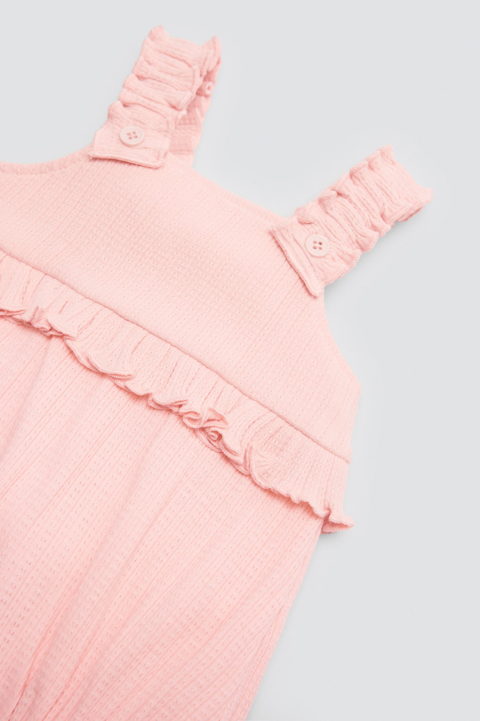 Peto bebé sin mangas detalle volante - Ysabel Mora