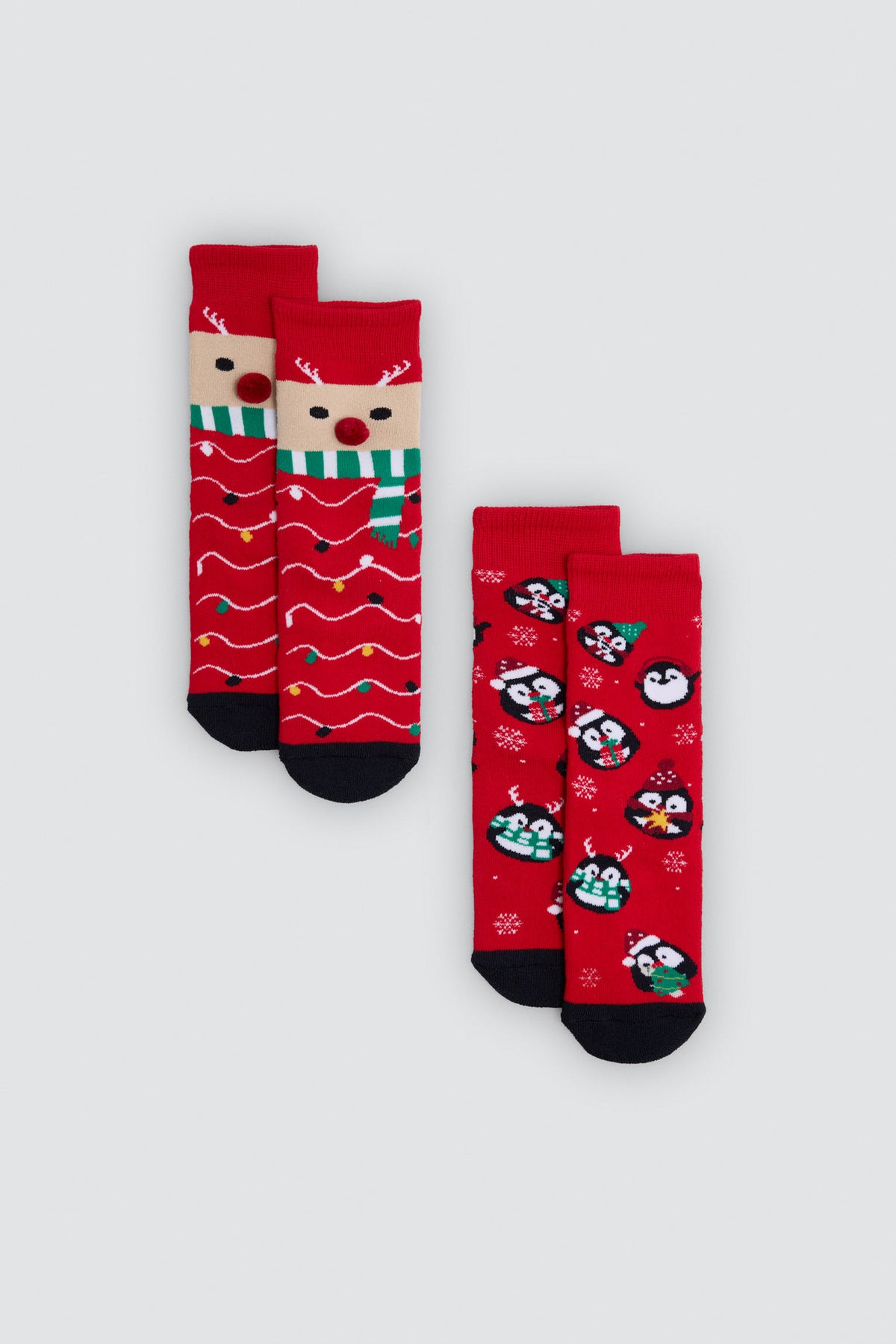 Pack 2 calzini bambino estampado navidad renos y pingüinos