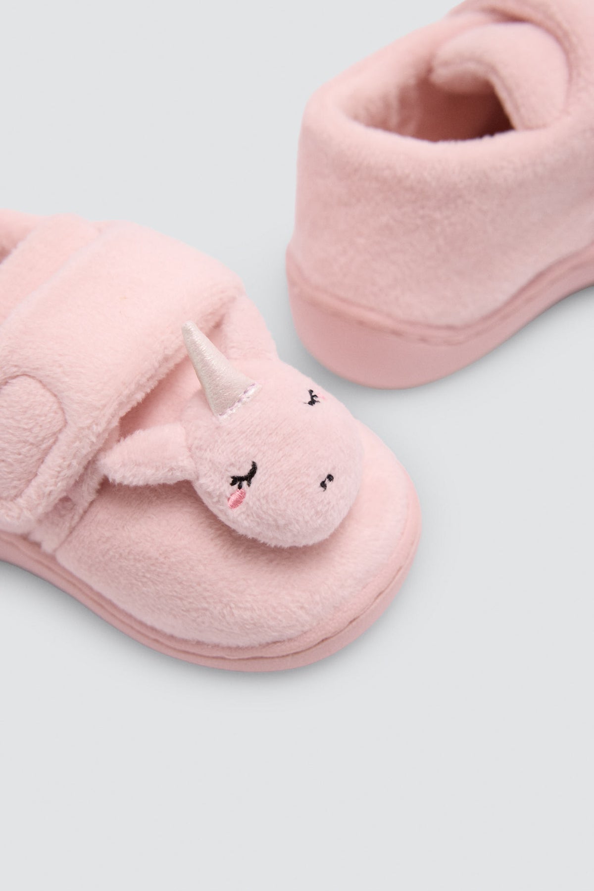 Pantofole da casa per neonata con faccina unicorno