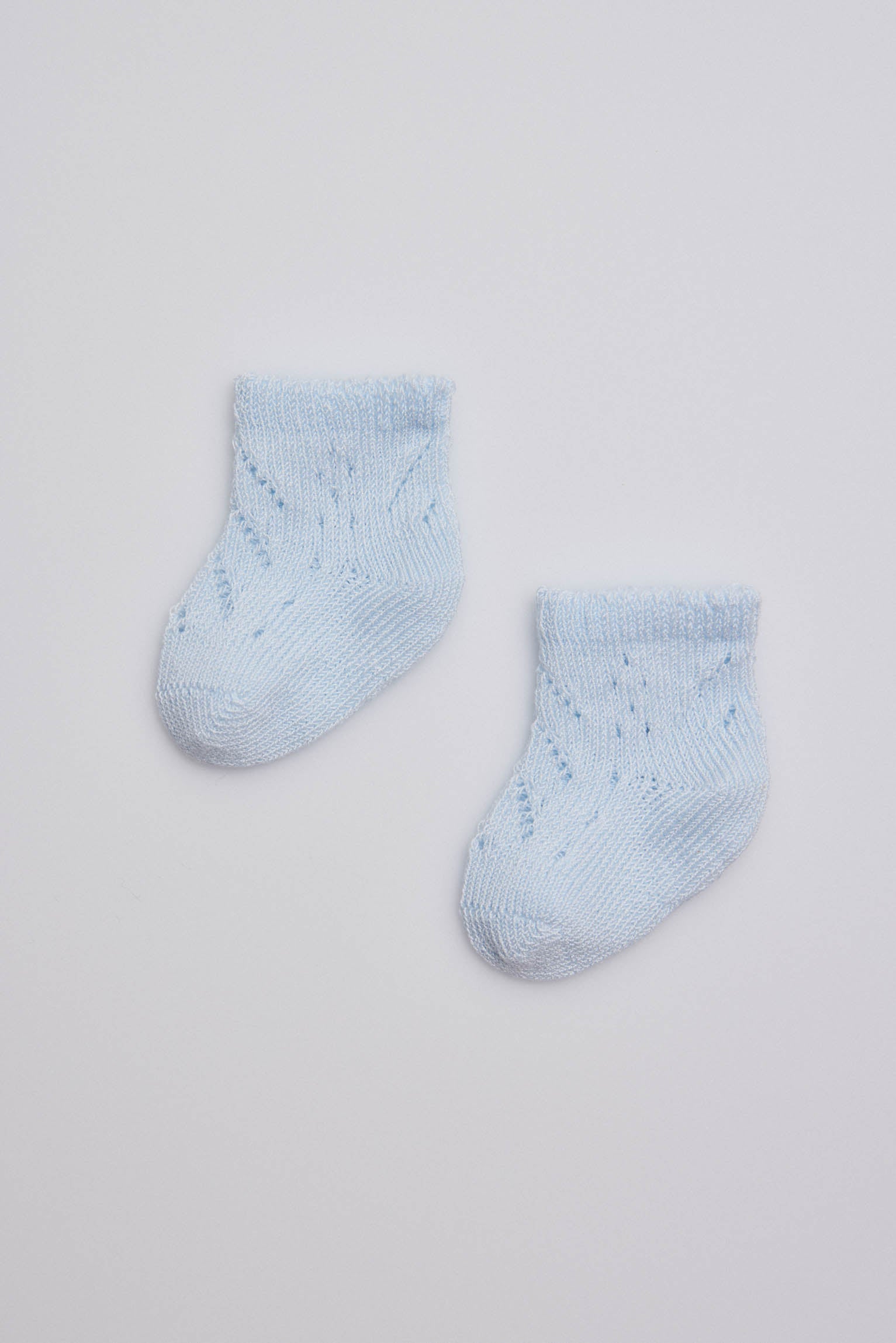 62687-1-calcetin-recien-nacido---Celeste-4ca037a3-a64b-4d89-a962-e808dde9bc08