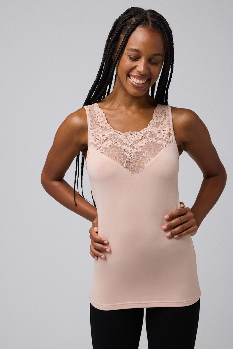 T-shirt termica in pizzo color carne senza maniche