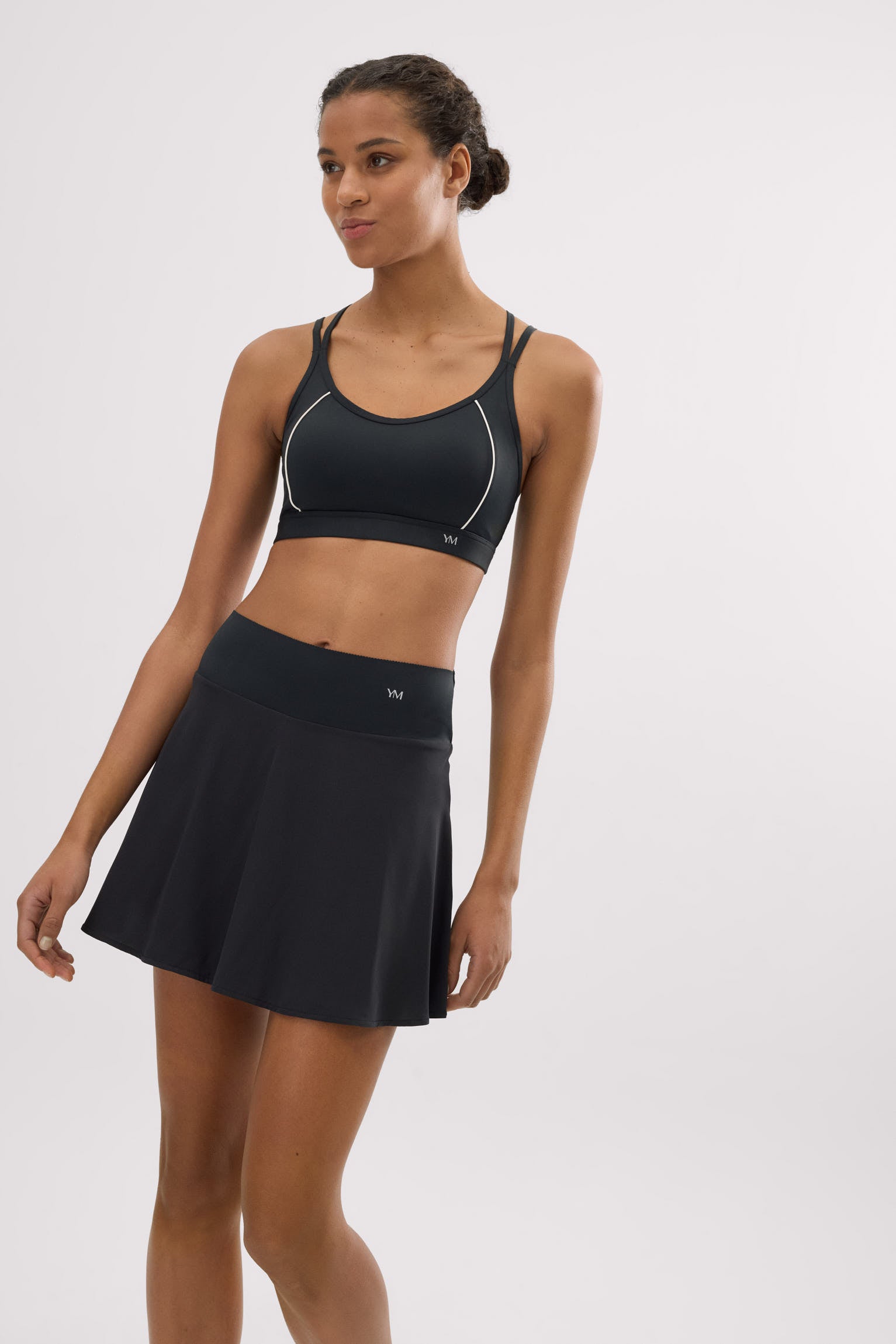 Falda deportiva Compressive con short y bolsillo interior negra - Ysabel Mora