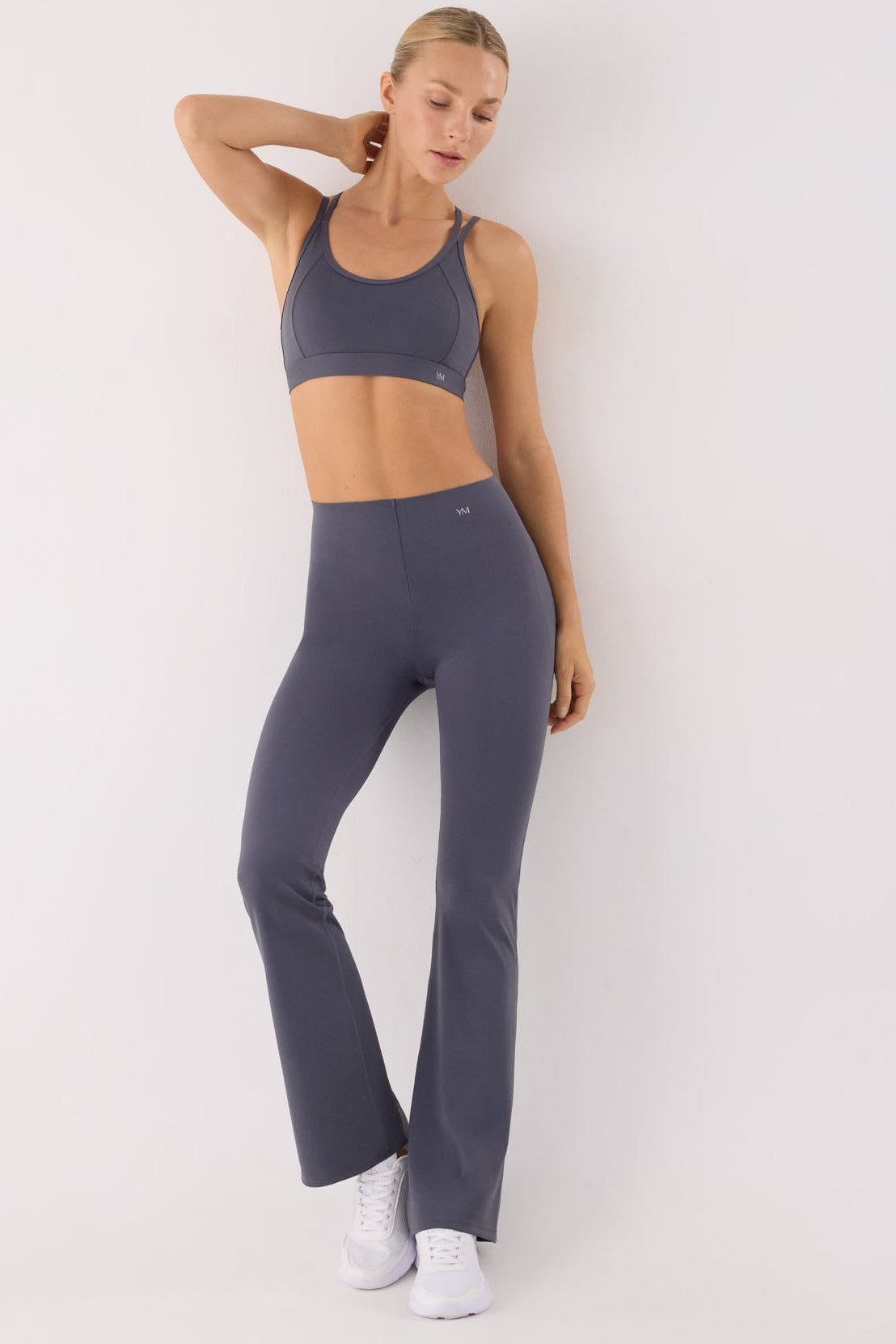 leggings deportivos compressive acampanados tiro alto compressive detalle tejido acabado tejido moldeador con control abdominal corte láser