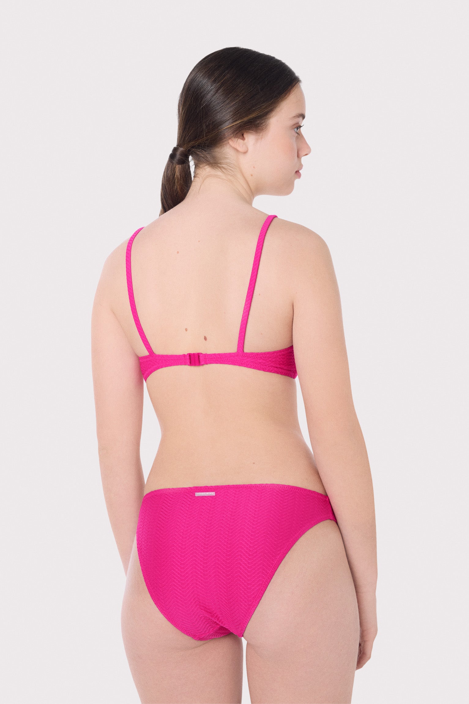 Slip bikini fucsia liscio testurizzato Juveni