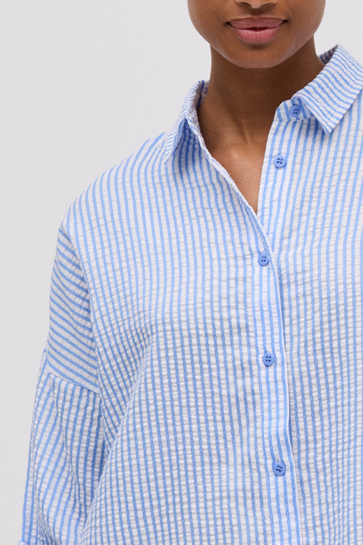 Maglia extra lunga a righe blu con texture