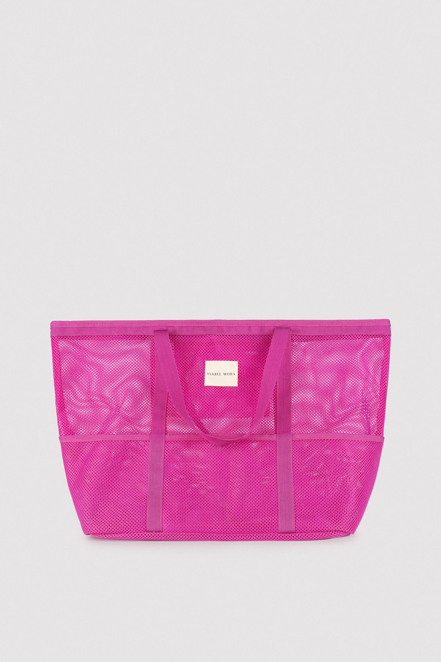 86292-electric-pink-bolsa-de-playa-calada-rosa-ysabel-mora