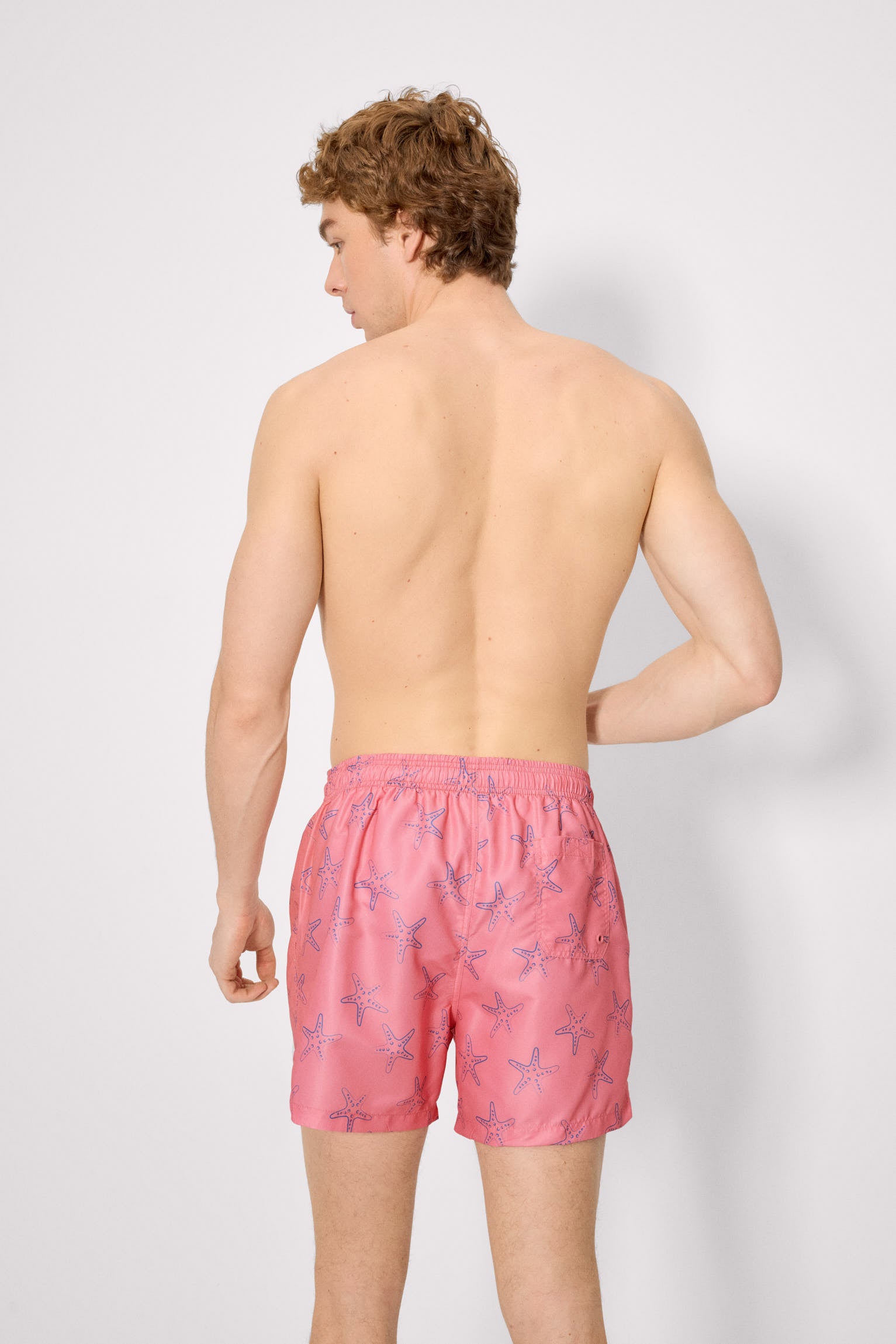 Costume da bagno intero con stampa di stelle marine rosa