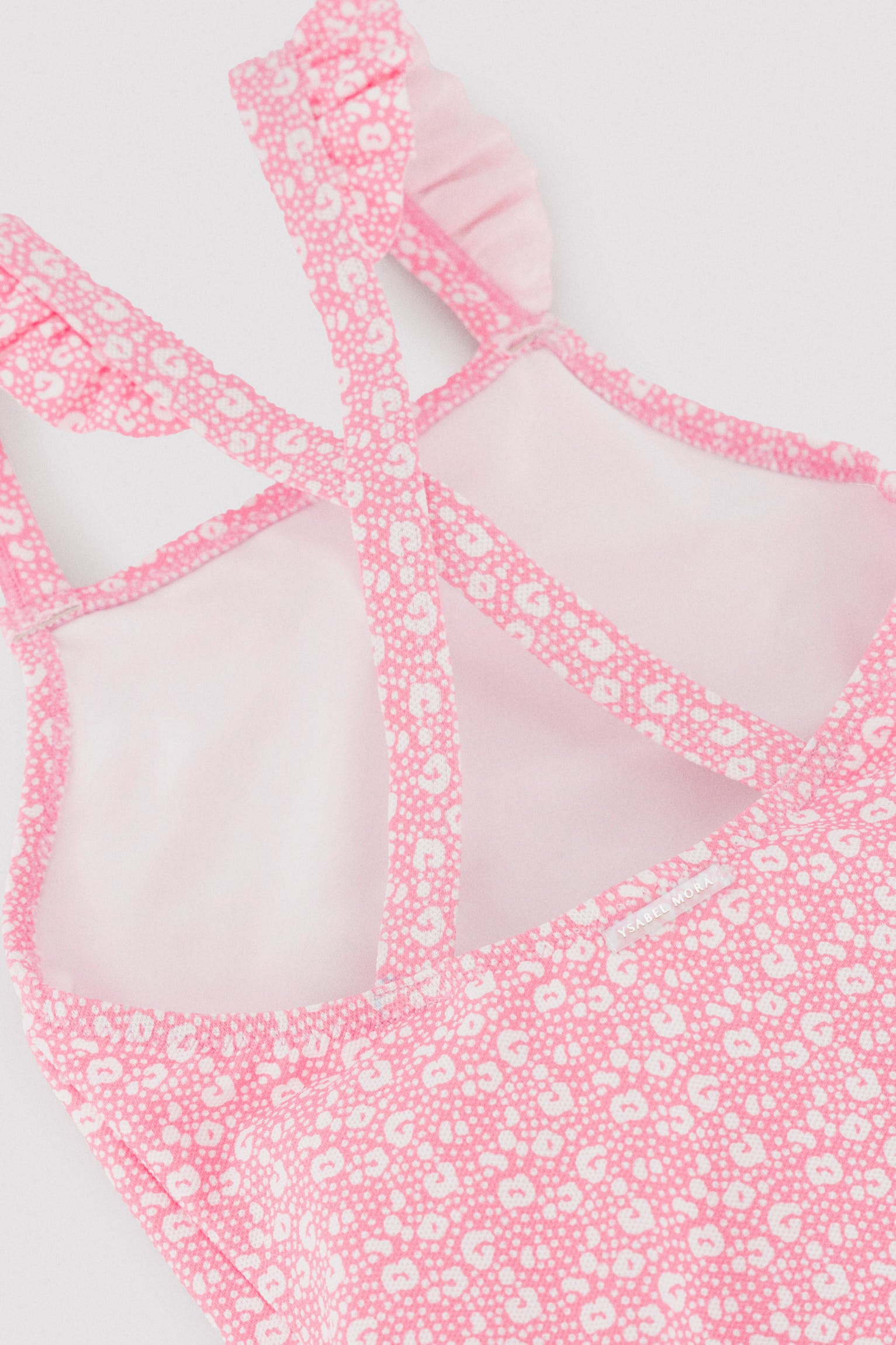 Costume da bagno da bambina con volant e spalline incrociate, stampa leopardata rosa