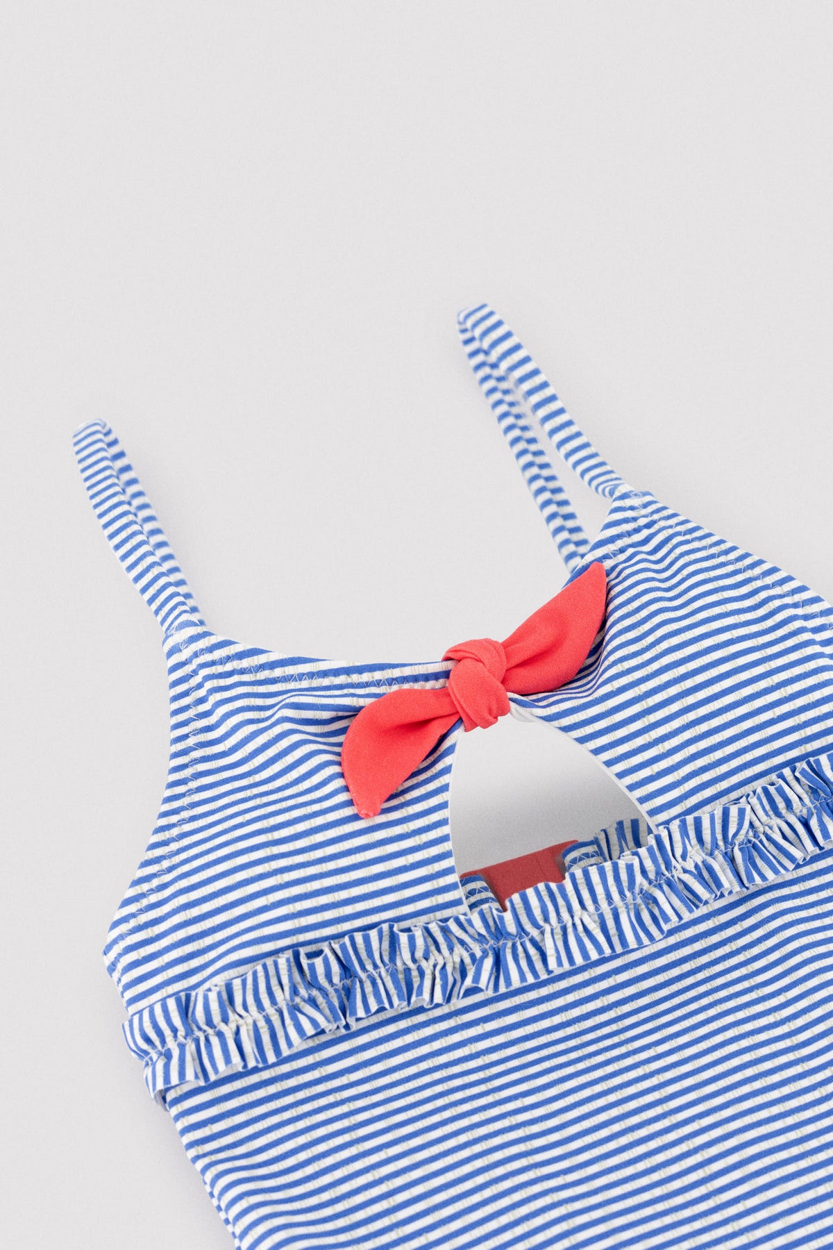 Bañador niña detalle lazo y volantes estampado rayas - Ysabel Mora