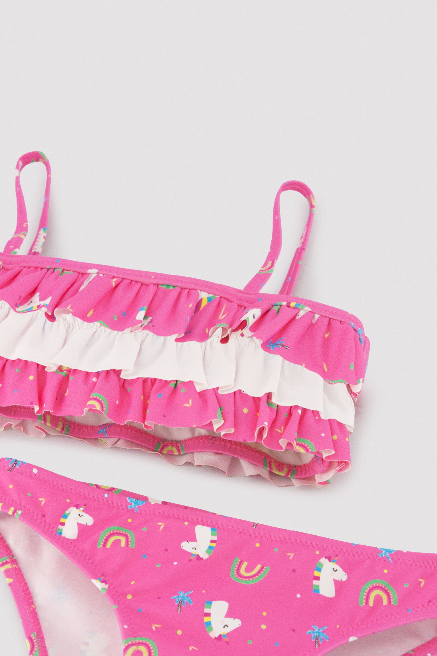 Bikini da bambina con volant stampato con unicorno