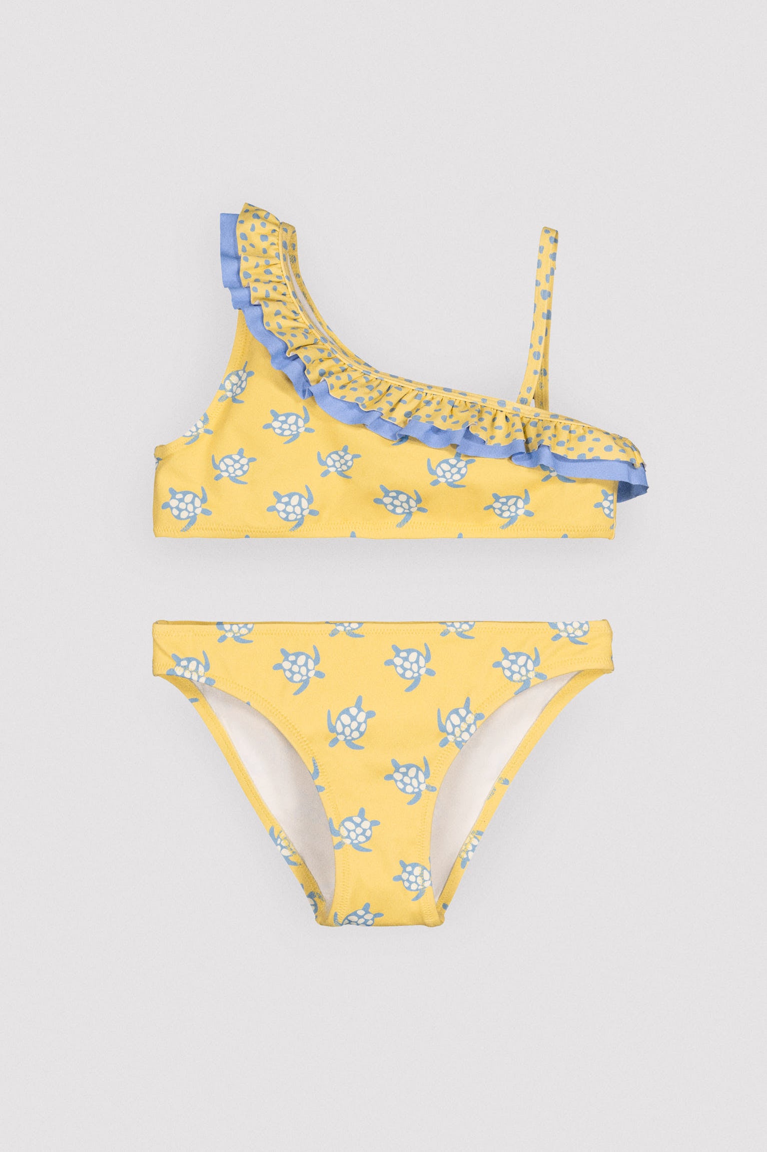 Bikini niña asimétrico detalle volantes estampado tortugas - Ysabel Mora