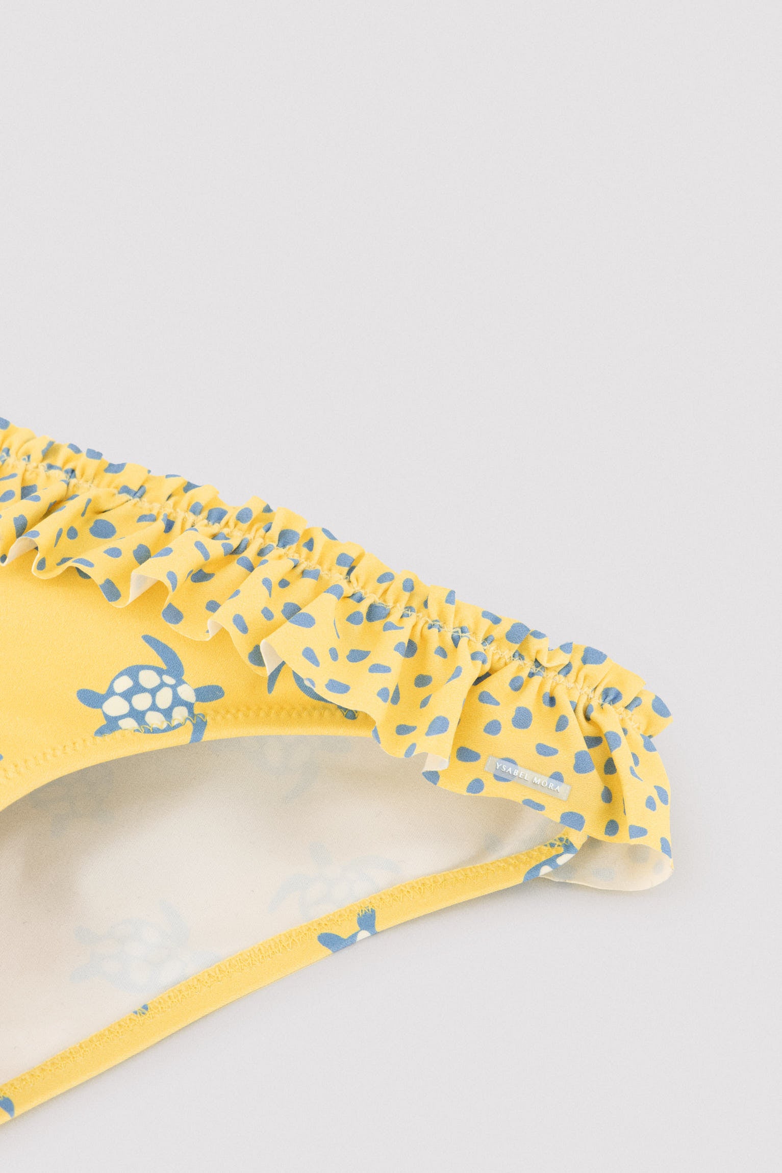 Culetín niña detalle volantes y lazos estampado tortugas - Ysabel Mora