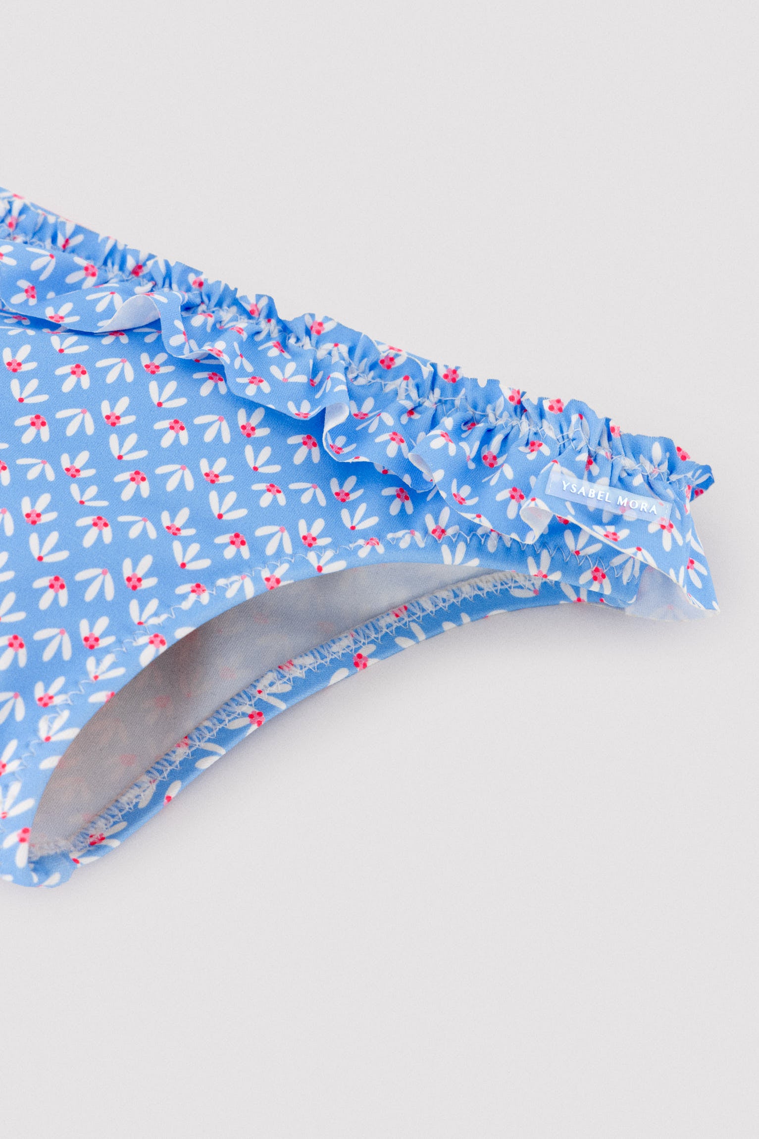 Pantaloncini a palloncino con volant e fiocchi, stampa floreale