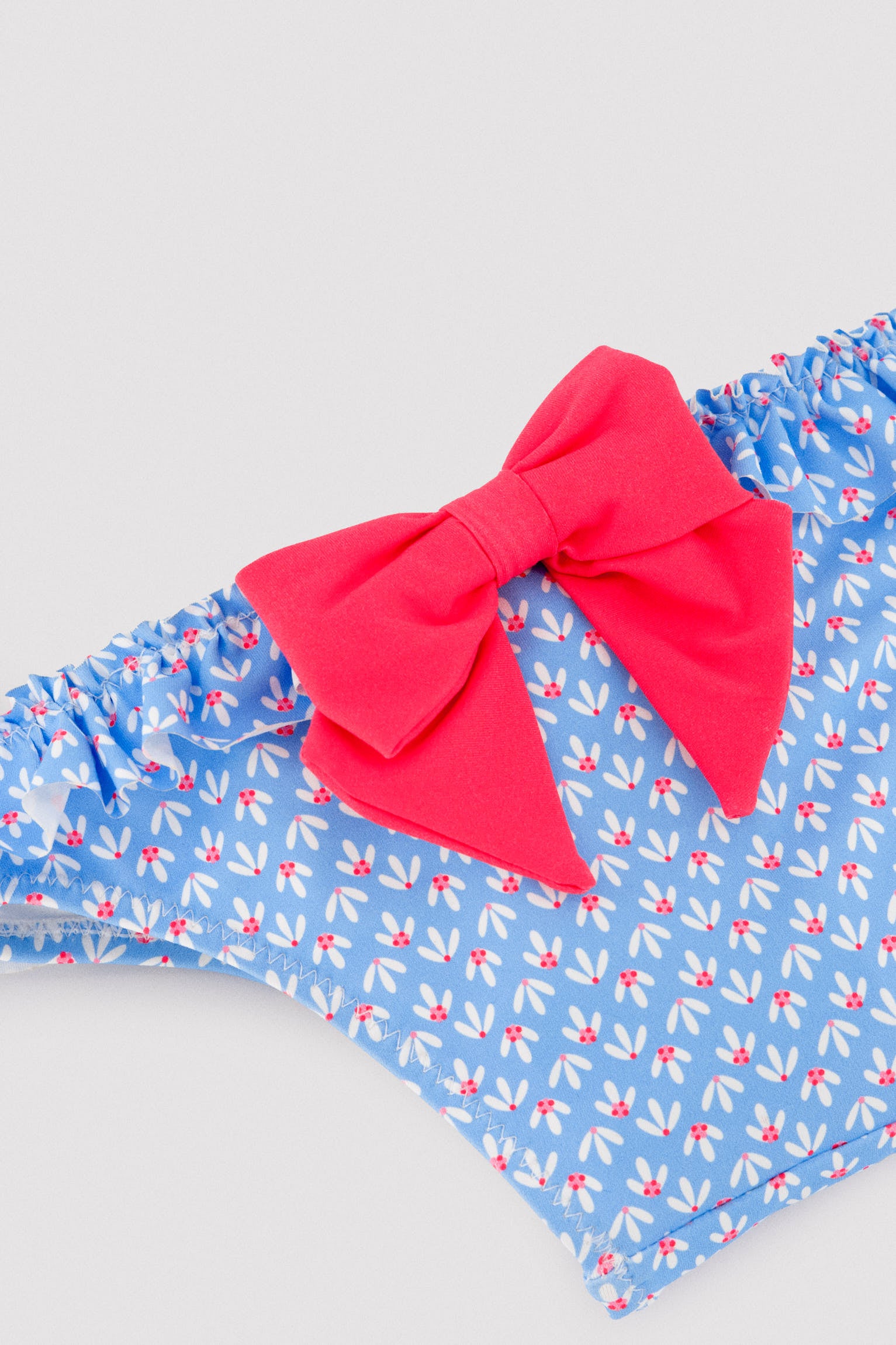 Pantaloncini a palloncino con volant e fiocchi, stampa floreale