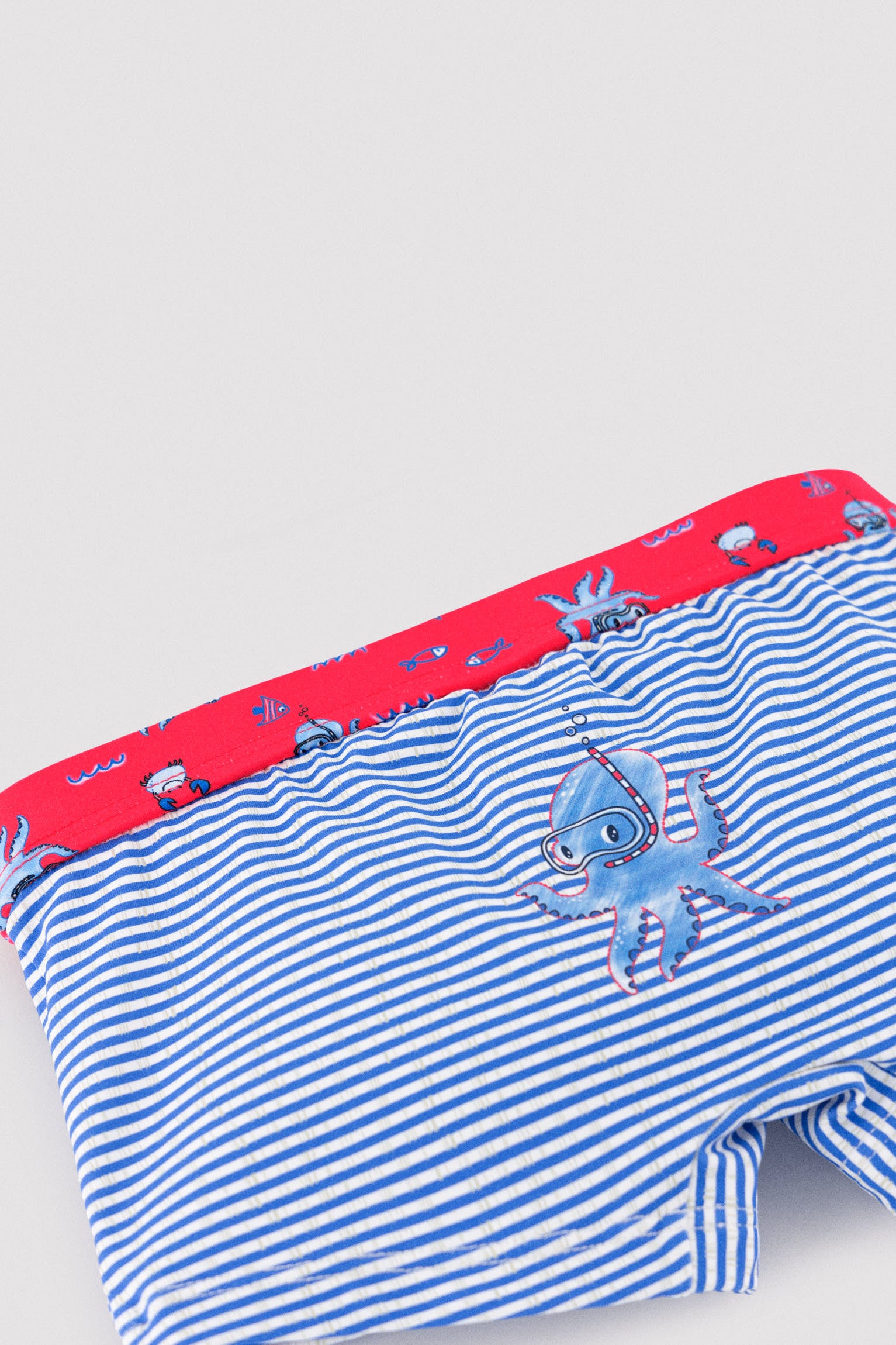 Costume da bagno boxer con stampa a righe e polpi