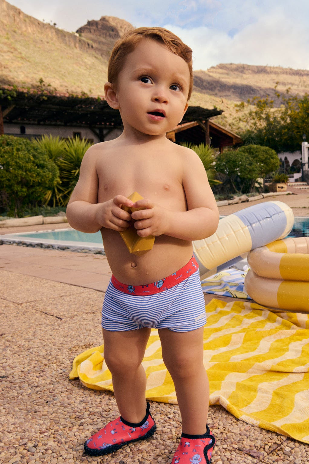 Costume da bagno boxer con stampa a righe e polpi