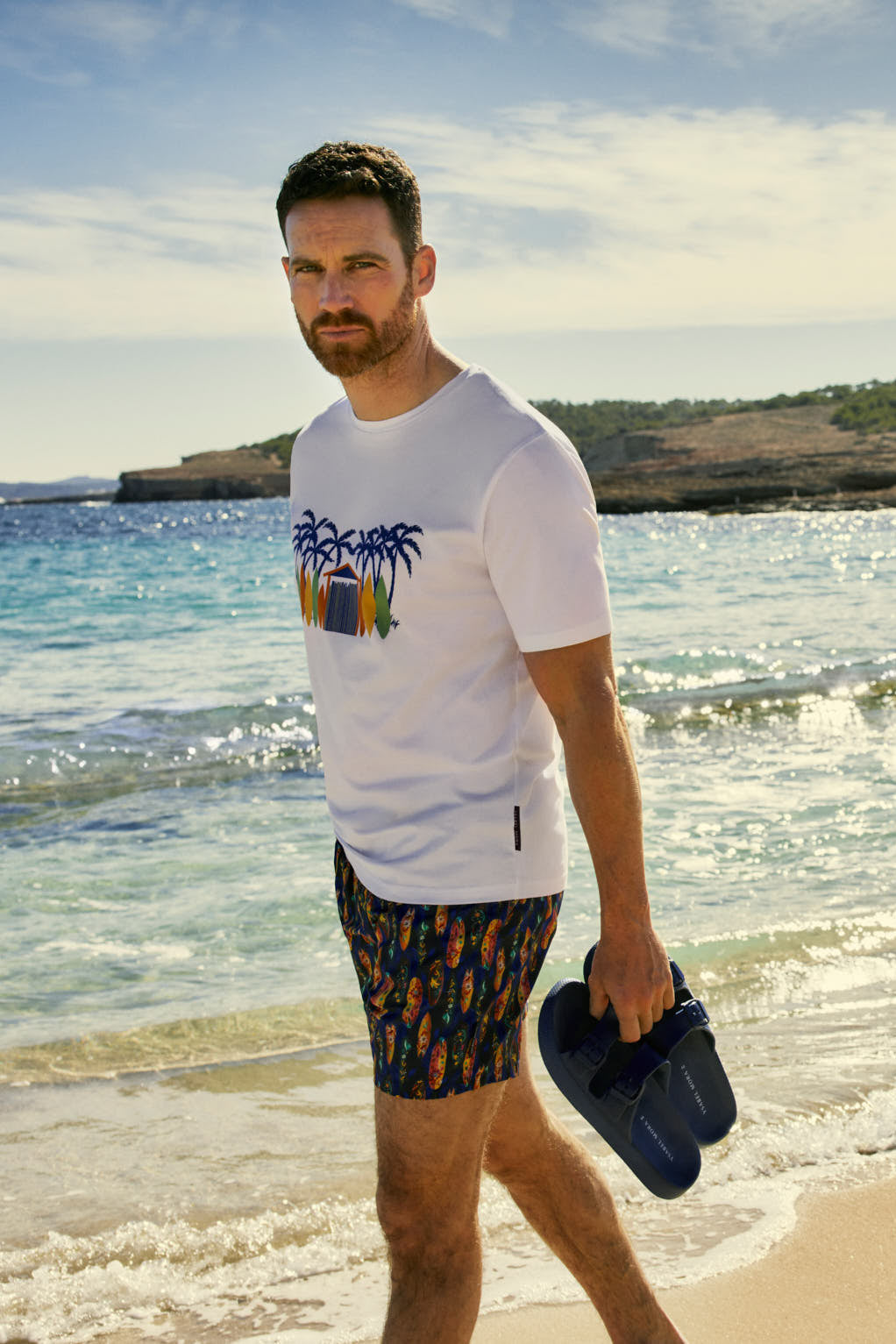 T-shirt a maniche corte con stampa tavola da surf