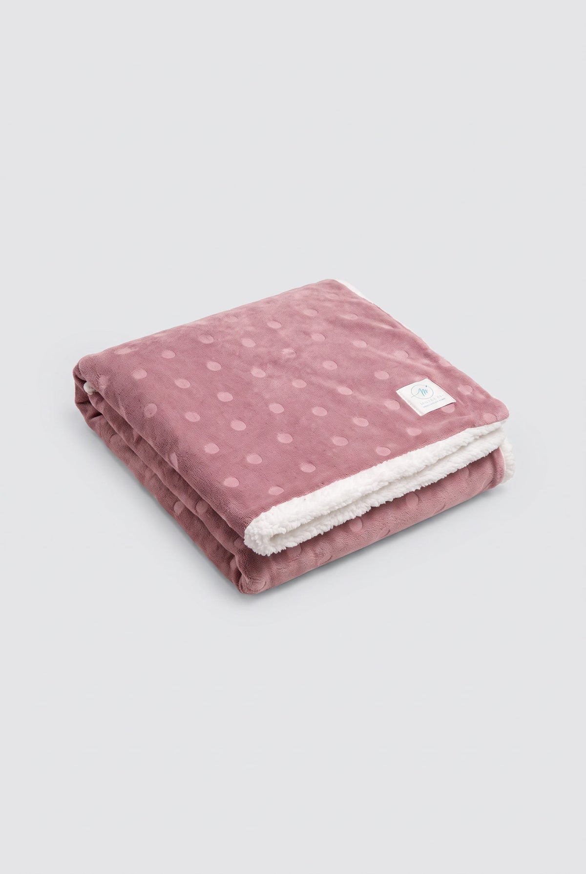 Coperta a pois in pile corallo e sherpa