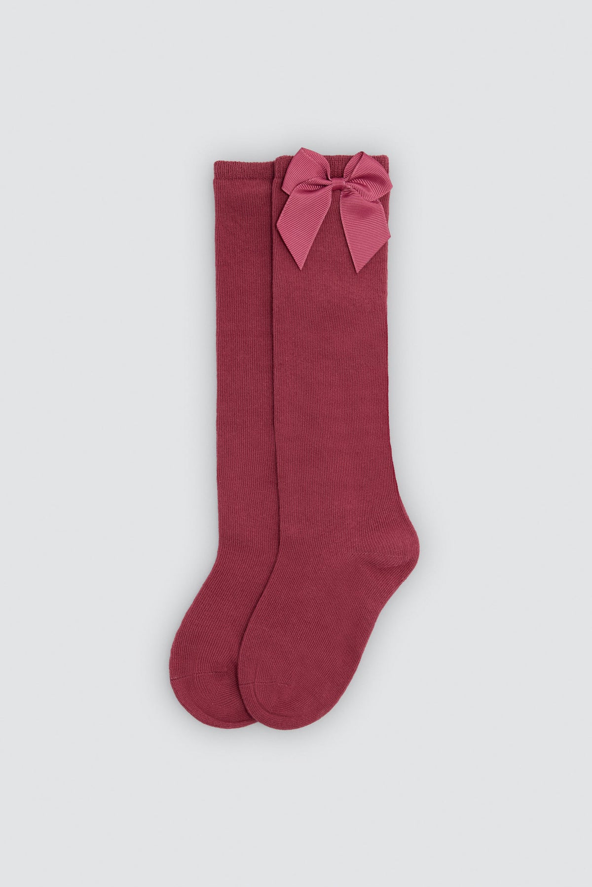 Calzino lungo da bambino con dettaglio fiocco rosa