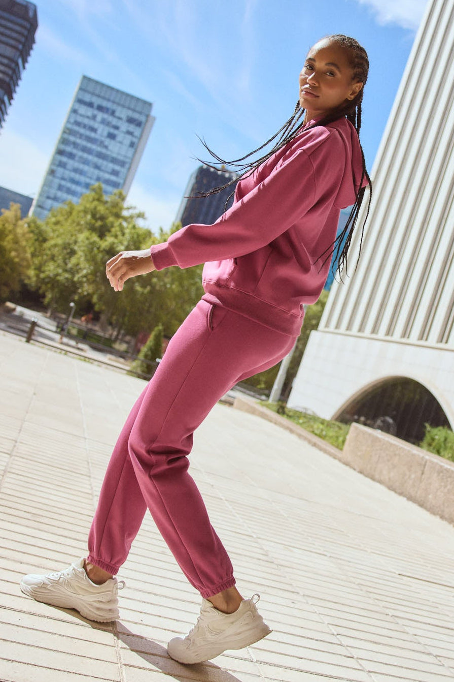 Completo di chándal sportivo afelpado felpa con capucha e jogger rosa