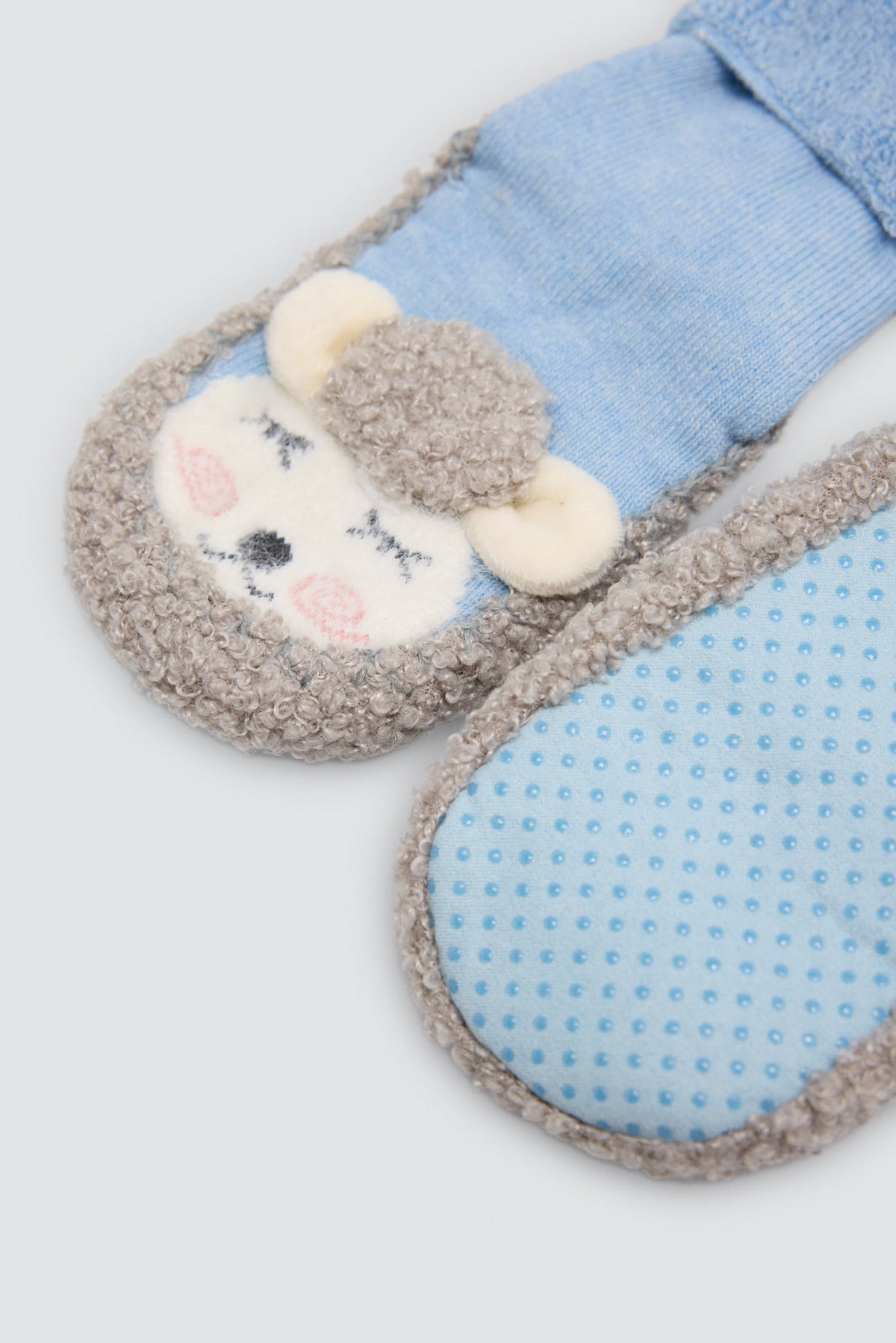 Calzini-pantofole termici per bebè con pecorella blu