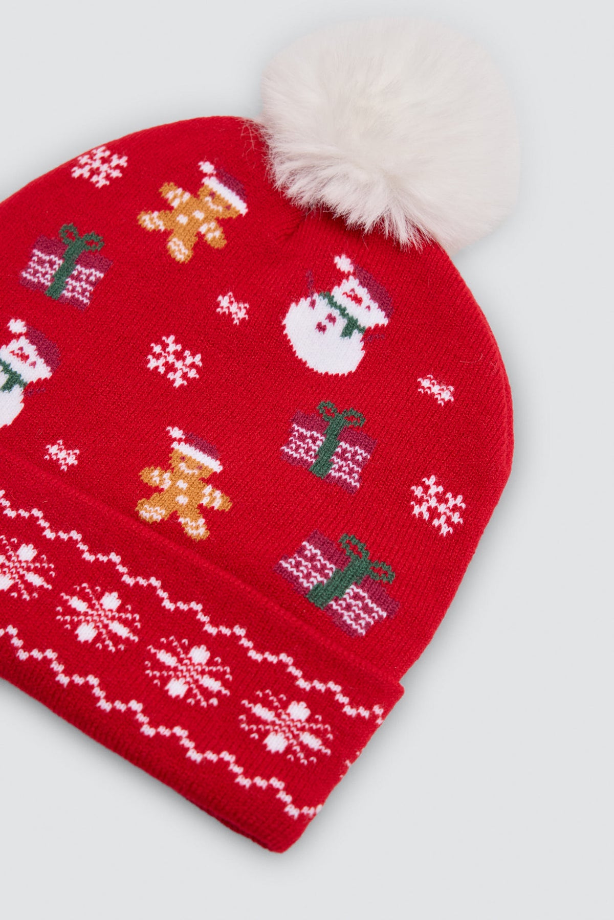 Berretto unisex con pompon e stampa natalizia