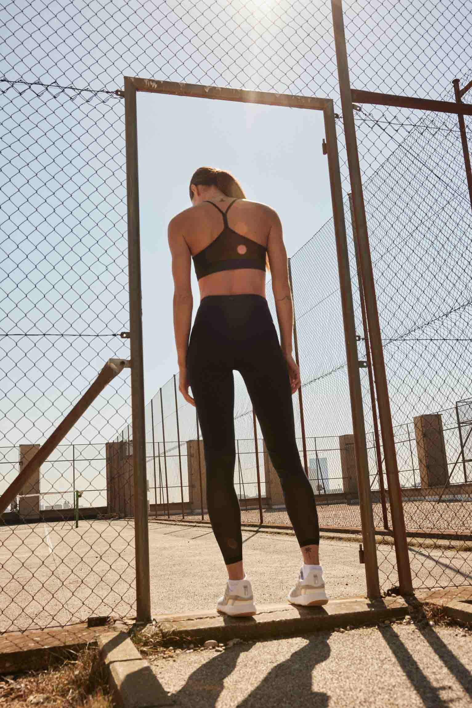 Leggings sportivi lunghi a vita incrociata neri