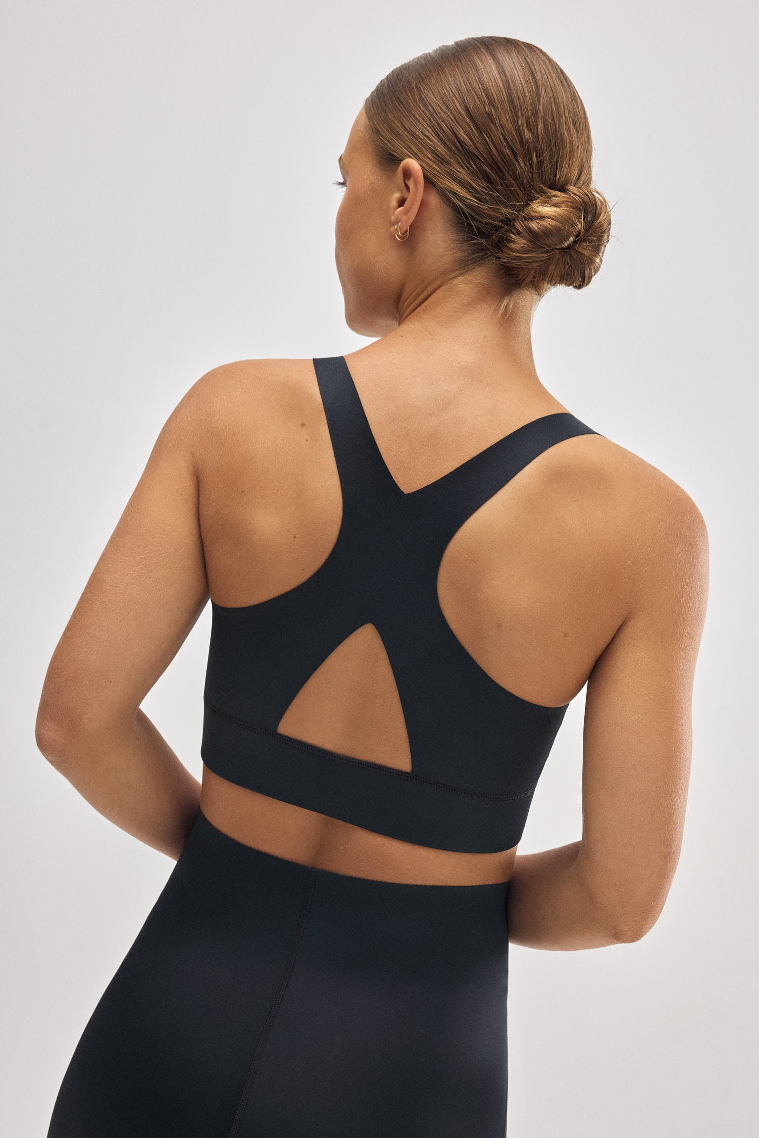 Reggiseno sportivo compressivo dettaglio apertura sostegno medio nero