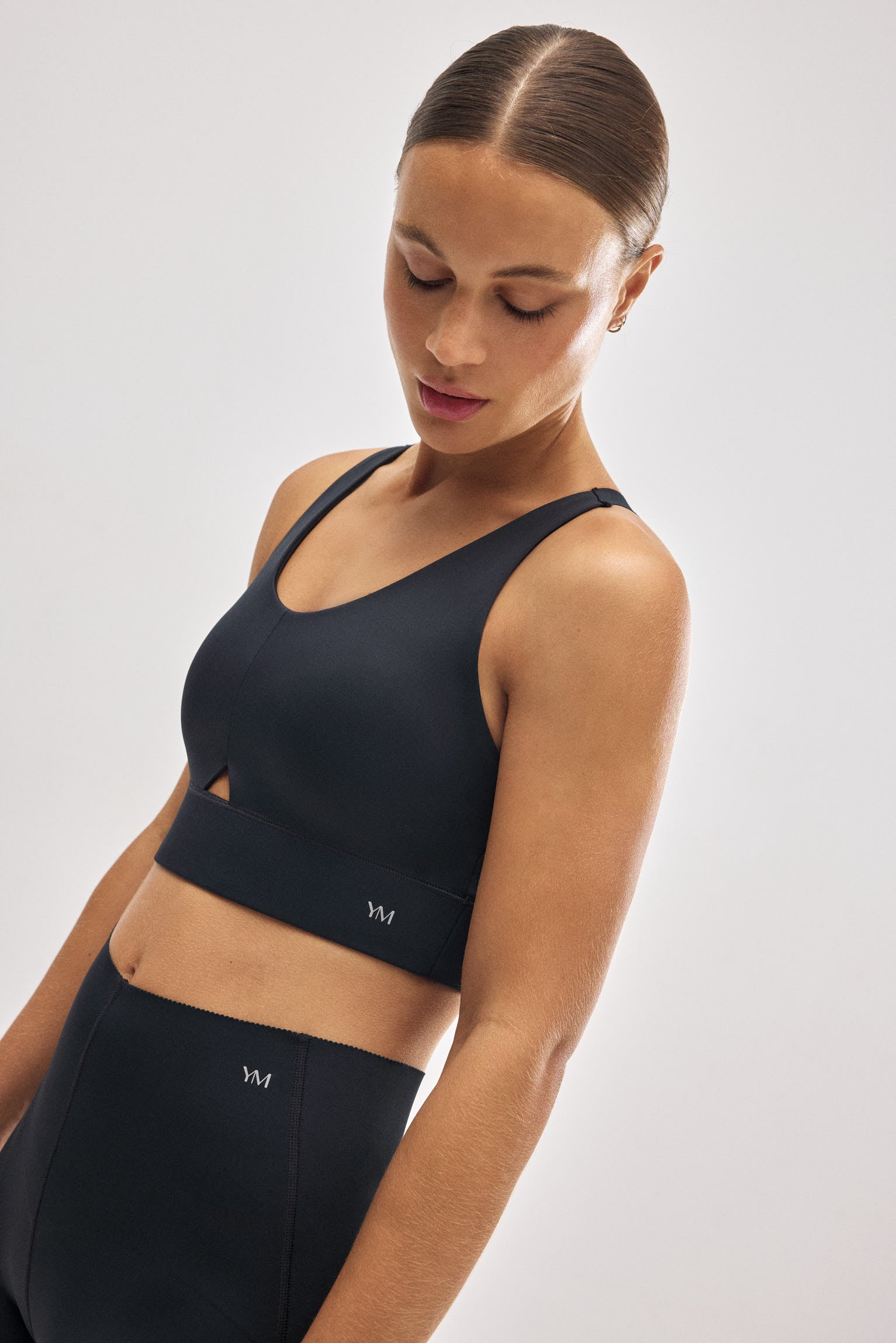 Reggiseno sportivo compressivo dettaglio apertura sostegno medio nero