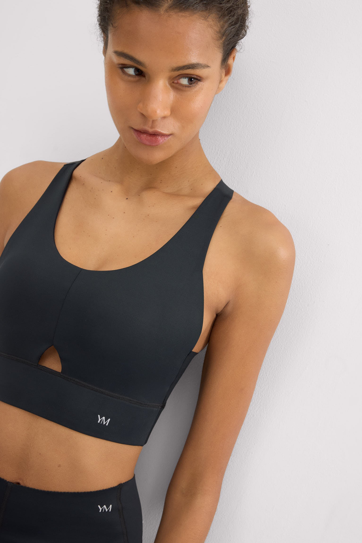 Reggiseno sportivo compressivo dettaglio apertura sostegno medio nero