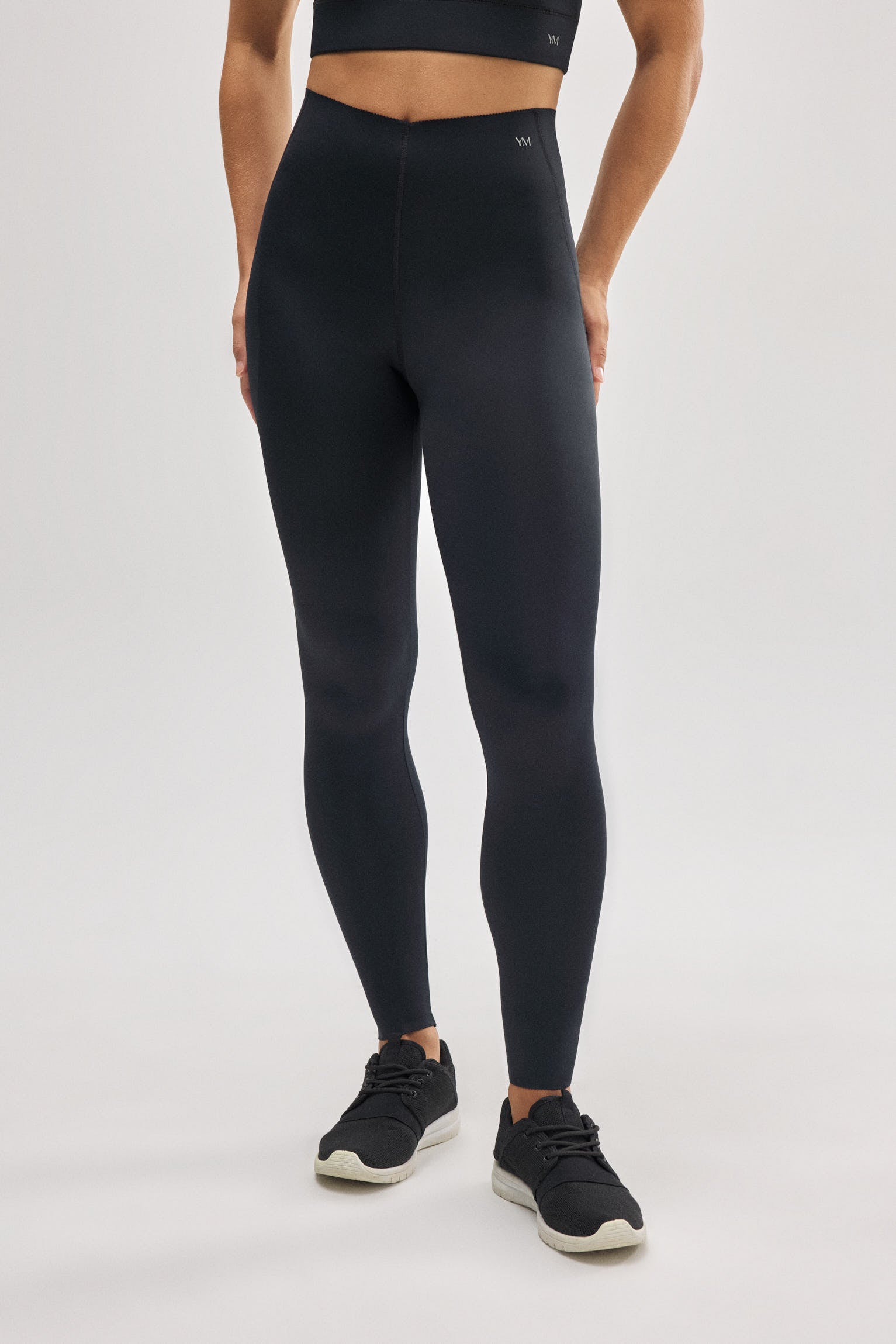 Leggings sportivi compressivi lunghi neri con pancia piatta