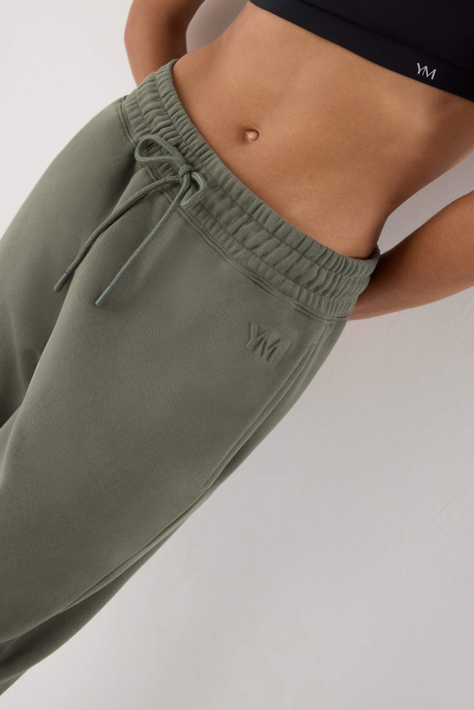 jogger deportivo mujer Slowloom vista lateral del conjunto fitness patrón relajado para el día a día