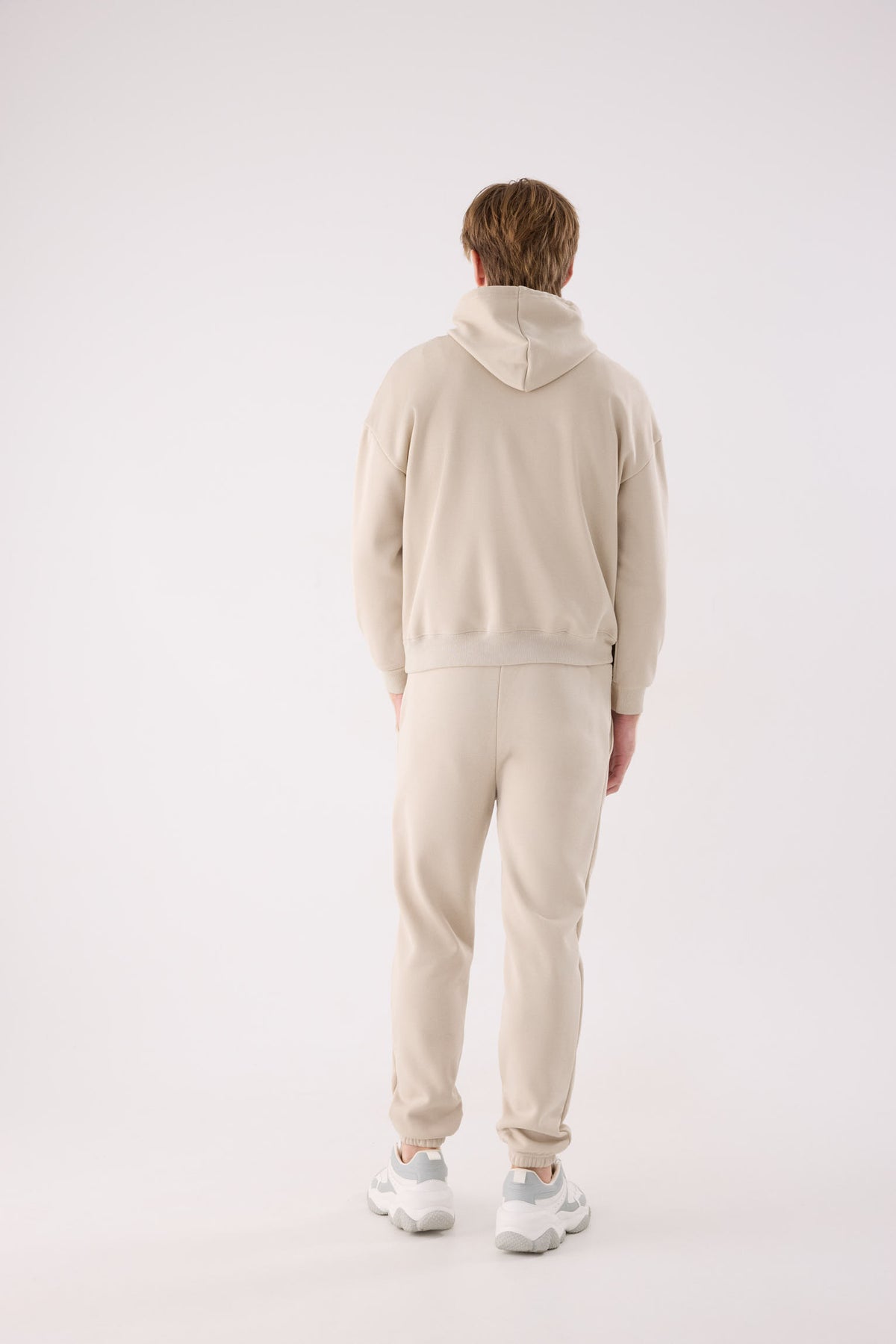 Pantalón sportivo uomo jogger afelpado con cintura ajustable beige