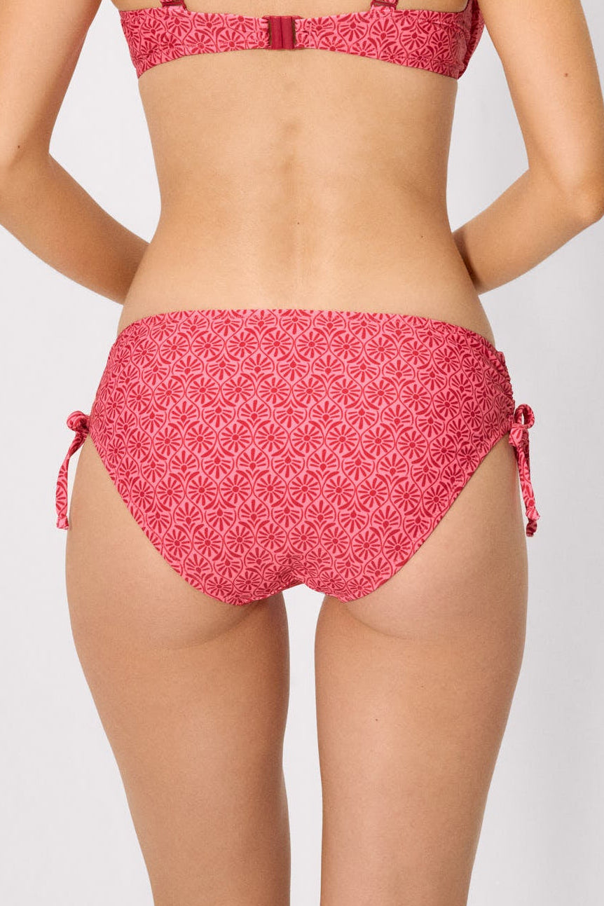 Slip bikini modellante midi a fiori rosa e rossi