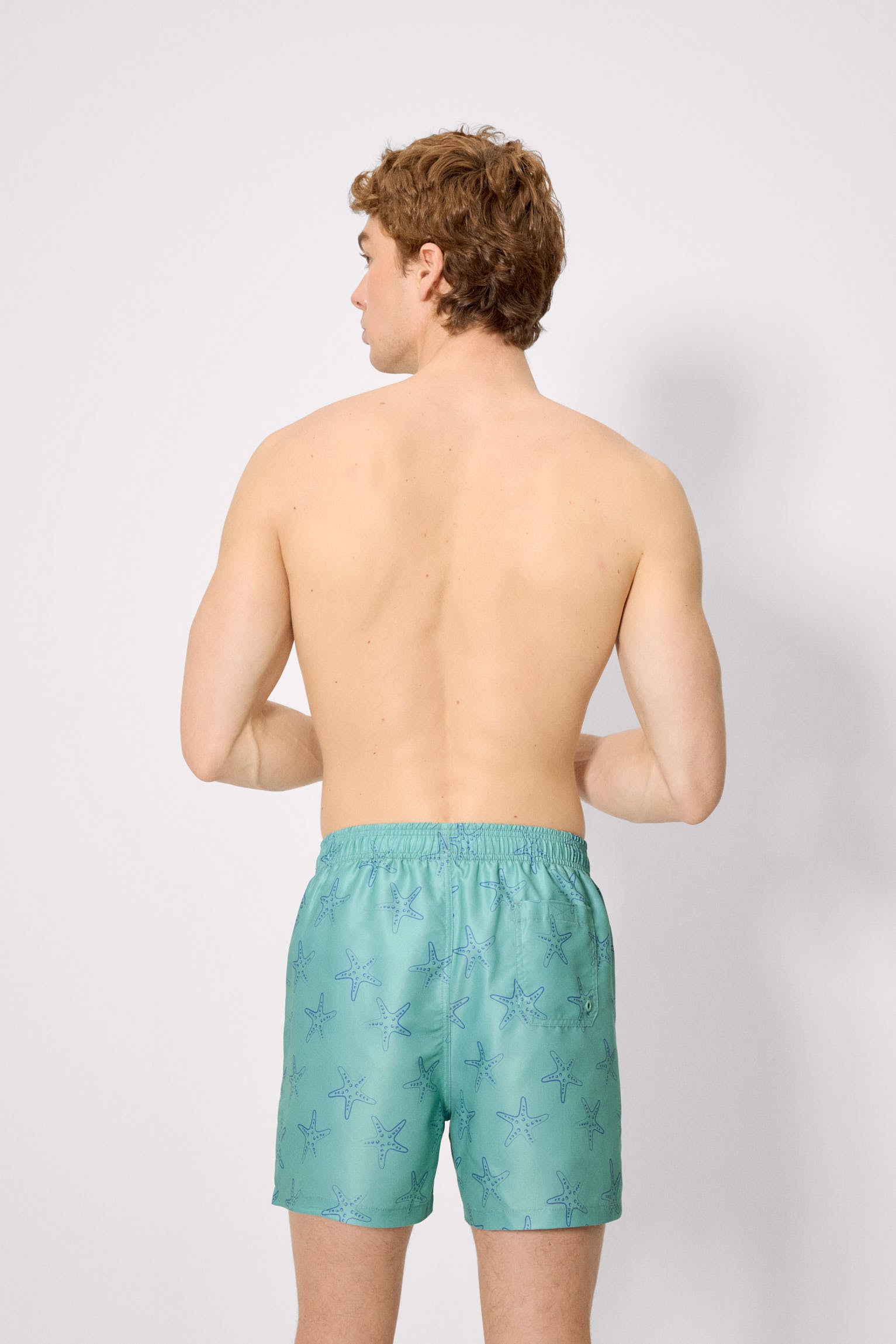 Costume intero con stampa a stella marina verde