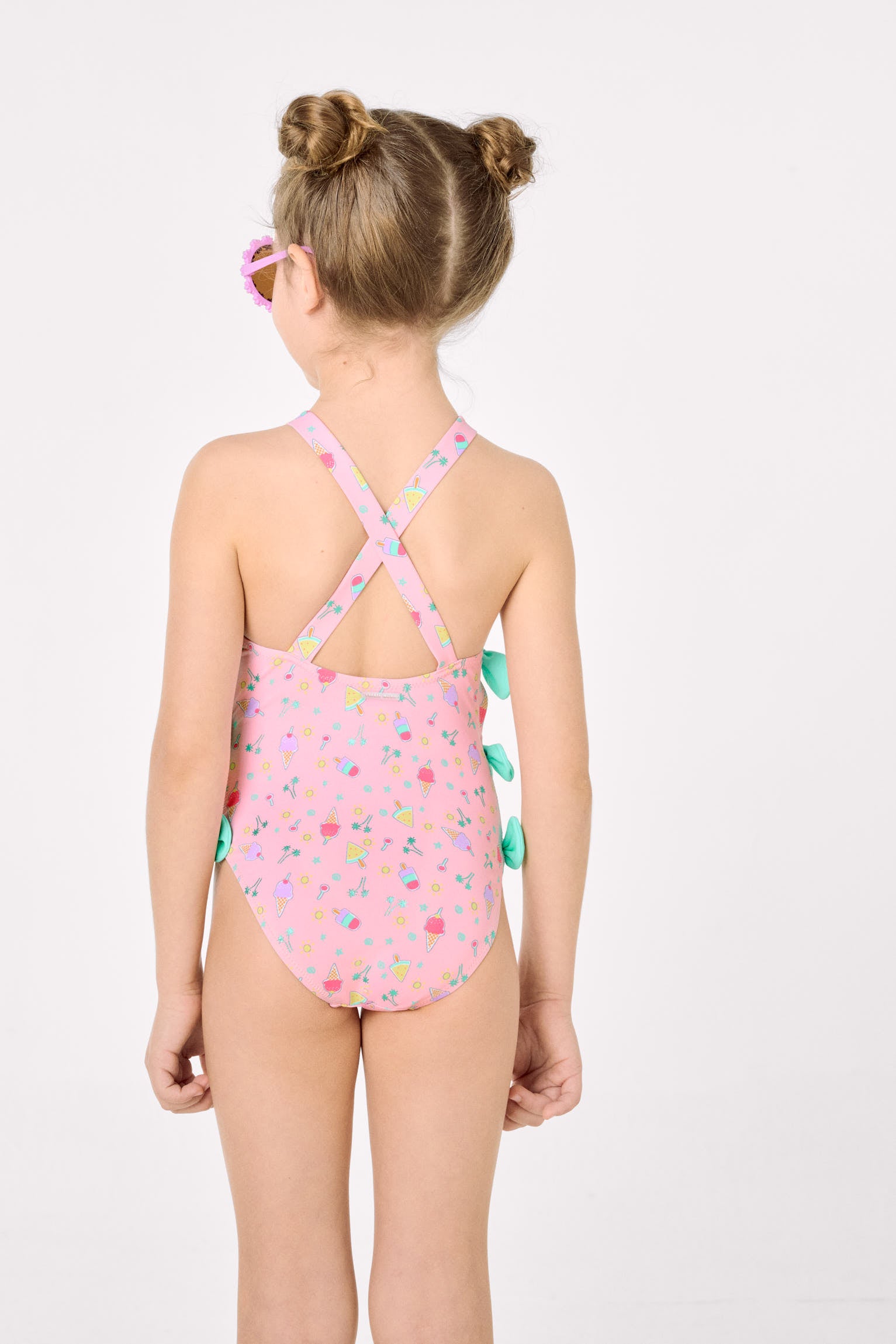 Costume da bagno da bambina con dettagli cut-out e fiocchi, stampa estiva