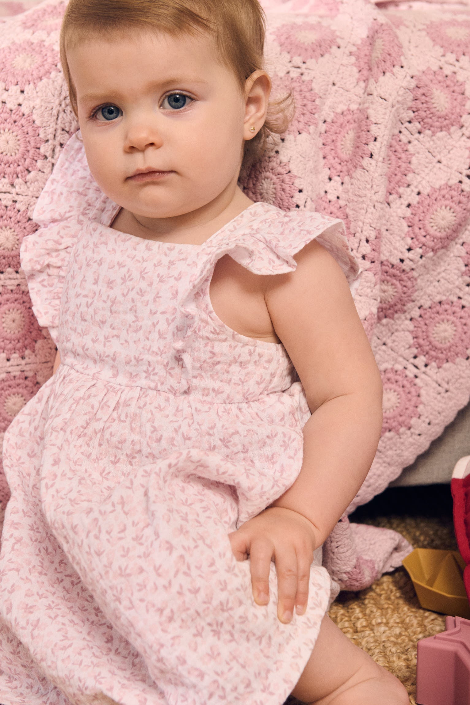 Vestito senza maniche per neonati con stampa floreale