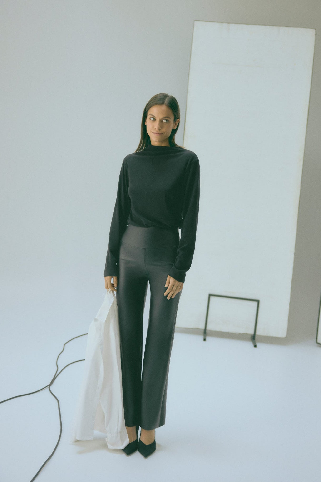 Leggings termici con pancia piatta e effetto pelle nera svasata