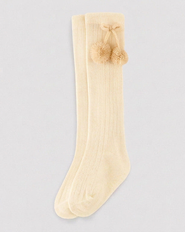 Calcetín bambino largo detalle pompones beige