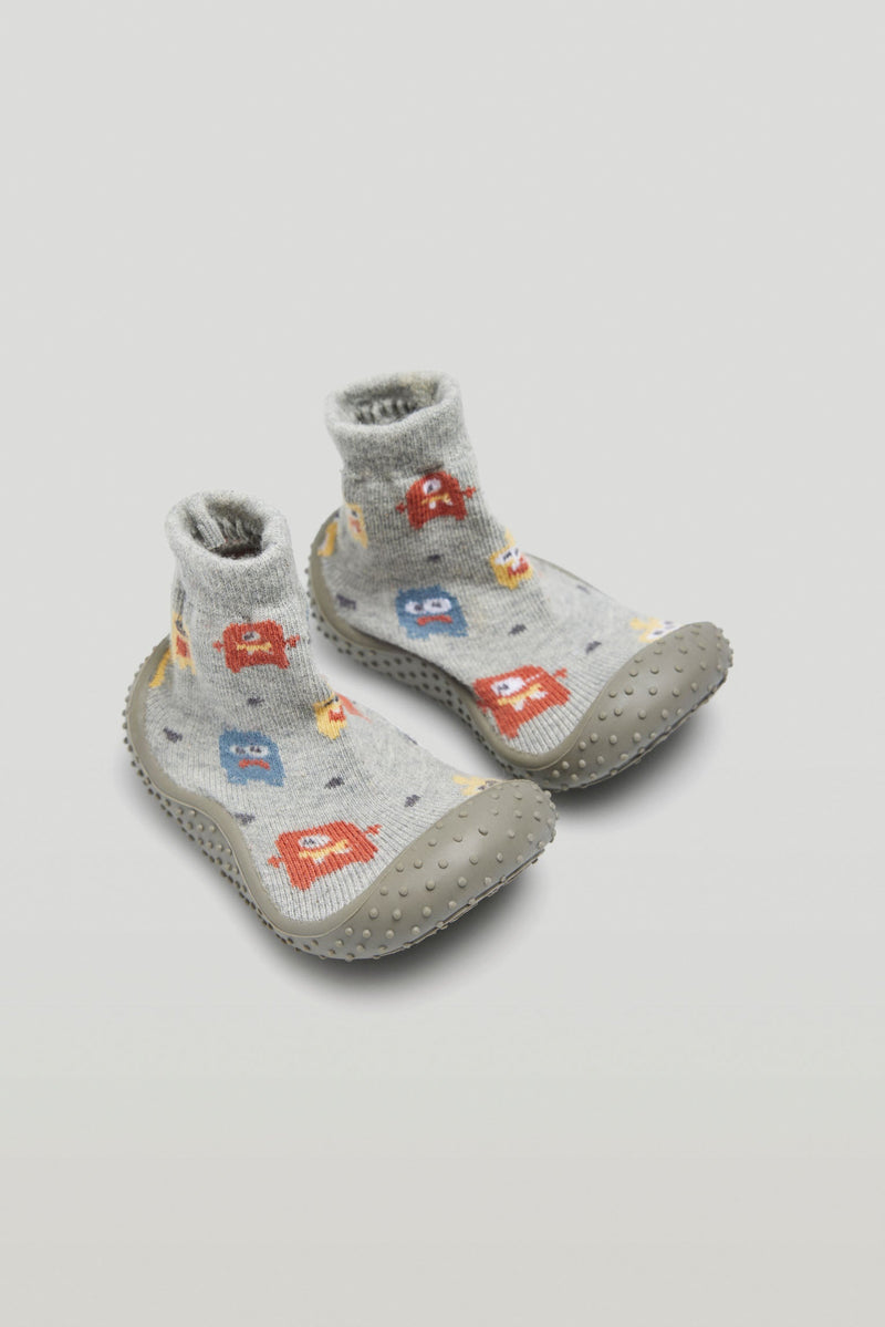 Pantofola a calzino per i primi passi del bambino